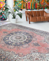 Vintage Turkish rug in living room setting, old rug, antique rug, pastel colors, faded colors, Turkish rug, vintage rug, soft rug, Portland, Oregon, rug store, rug shop, local shop