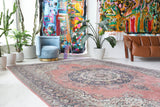 Vintage Turkish rug in living room setting, old rug, antique rug, pastel colors, faded colors, Turkish rug, vintage rug, soft rug, Portland, Oregon, rug store, rug shop, local shop