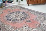 Vintage Turkish rug in living room setting, old rug, antique rug, pastel colors, faded colors, Turkish rug, vintage rug, soft rug, Portland, Oregon, rug store, rug shop, local shop