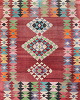 Vintage kilim rug in living room setting, old rug, antique rug, pastel colors, faded colors, Turkish rug, vintage rug, soft rug, Portland, Oregon, rug store, rug shop, local shop, earthy tones, earthy colors, warm colors