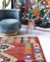 Vintage kilim rug in living room setting, old rug, antique rug, pastel colors, faded colors, Turkish rug, vintage rug, soft rug, Portland, Oregon, rug store, rug shop, local shop, earthy tones, earthy colors, warm colors