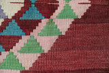 Vintage kilim rug in living room setting, old rug, antique rug, pastel colors, faded colors, Turkish rug, vintage rug, soft rug, Portland, Oregon, rug store, rug shop, local shop, earthy tones, earthy colors, warm colors