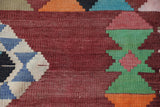 Vintage kilim rug in living room setting, old rug, antique rug, pastel colors, faded colors, Turkish rug, vintage rug, soft rug, Portland, Oregon, rug store, rug shop, local shop, earthy tones, earthy colors, warm colors