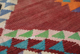 Vintage kilim rug in living room setting, old rug, antique rug, pastel colors, faded colors, Turkish rug, vintage rug, soft rug, Portland, Oregon, rug store, rug shop, local shop, earthy tones, earthy colors, warm colors