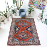 Vintage Turkish rug in a living room setting, Area rug in a living room setting, pile rug, Turkish rug, custom rug, modern rug, portland, rug shop, bright colors, wild shaman, soft rug, bold color, Portland, Oregon, rug store, rug shop, local shop
