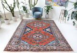 Vintage Turkish rug in a living room setting, Area rug in a living room setting, pile rug, Turkish rug, custom rug, modern rug, portland, rug shop, bright colors, wild shaman, soft rug, bold color, Portland, Oregon, rug store, rug shop, local shop