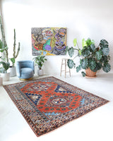 Vintage Turkish rug in a living room setting, Area rug in a living room setting, pile rug, Turkish rug, custom rug, modern rug, portland, rug shop, bright colors, wild shaman, soft rug, bold color, Portland, Oregon, rug store, rug shop, local shop