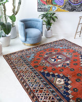Vintage Turkish rug in a living room setting, Area rug in a living room setting, pile rug, Turkish rug, custom rug, modern rug, portland, rug shop, bright colors, wild shaman, soft rug, bold color, Portland, Oregon, rug store, rug shop, local shop