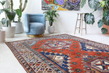 Vintage Turkish rug in a living room setting, Area rug in a living room setting, pile rug, Turkish rug, custom rug, modern rug, portland, rug shop, bright colors, wild shaman, soft rug, bold color, Portland, Oregon, rug store, rug shop, local shop