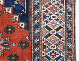 Vintage Turkish rug in a living room setting, Area rug in a living room setting, pile rug, Turkish rug, custom rug, modern rug, portland, rug shop, bright colors, wild shaman, soft rug, bold color, Portland, Oregon, rug store, rug shop, local shop