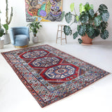 Vintage Turkish rug in a living room setting, Area rug in a living room setting, pile rug, Turkish rug, custom rug, modern rug, portland, rug shop, bright colors, wild shaman, soft rug, bold color, Portland, Oregon, rug store, rug shop, local shop
