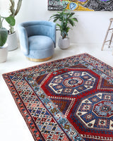 Vintage Turkish rug in a living room setting, Area rug in a living room setting, pile rug, Turkish rug, custom rug, modern rug, portland, rug shop, bright colors, wild shaman, soft rug, bold color, Portland, Oregon, rug store, rug shop, local shop