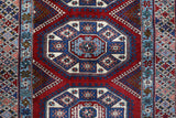Vintage Turkish rug in a living room setting, Area rug in a living room setting, pile rug, Turkish rug, custom rug, modern rug, portland, rug shop, bright colors, wild shaman, soft rug, bold color, Portland, Oregon, rug store, rug shop, local shop