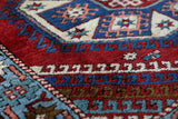 Vintage Turkish rug in a living room setting, Area rug in a living room setting, pile rug, Turkish rug, custom rug, modern rug, portland, rug shop, bright colors, wild shaman, soft rug, bold color, Portland, Oregon, rug store, rug shop, local shop