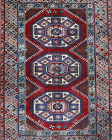 Vintage Turkish rug in a living room setting, Area rug in a living room setting, pile rug, Turkish rug, custom rug, modern rug, portland, rug shop, bright colors, wild shaman, soft rug, bold color, Portland, Oregon, rug store, rug shop, local shop