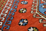 Vintage Turkish rug in a living room setting, Area rug in a living room setting, pile rug, Turkish rug, custom rug, modern rug, portland, rug shop, bright colors, wild shaman, soft rug, bold color, Portland, Oregon, rug store, rug shop, local shop