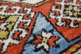 Vintage Turkish rug in a living room setting, Area rug in a living room setting, pile rug, Turkish rug, custom rug, modern rug, portland, rug shop, bright colors, wild shaman, soft rug, bold color, Portland, Oregon, rug store, rug shop, local shop
