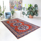 Vintage Turkish rug in a living room setting, Area rug in a living room setting, pile rug, Turkish rug, custom rug, modern rug, portland, rug shop, bright colors, wild shaman, soft rug, bold color, Portland, Oregon, rug store, rug shop, local shop