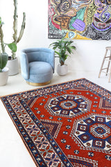 Vintage Turkish rug in a living room setting, Area rug in a living room setting, pile rug, Turkish rug, custom rug, modern rug, portland, rug shop, bright colors, wild shaman, soft rug, bold color, Portland, Oregon, rug store, rug shop, local shop