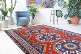 Vintage Turkish rug in a living room setting, Area rug in a living room setting, pile rug, Turkish rug, custom rug, modern rug, portland, rug shop, bright colors, wild shaman, soft rug, bold color, Portland, Oregon, rug store, rug shop, local shop