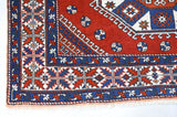 Vintage Turkish rug in a living room setting, Area rug in a living room setting, pile rug, Turkish rug, custom rug, modern rug, portland, rug shop, bright colors, wild shaman, soft rug, bold color, Portland, Oregon, rug store, rug shop, local shop