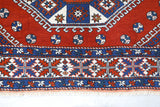 Vintage Turkish rug in a living room setting, Area rug in a living room setting, pile rug, Turkish rug, custom rug, modern rug, portland, rug shop, bright colors, wild shaman, soft rug, bold color, Portland, Oregon, rug store, rug shop, local shop