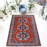 Vintage Turkish rug in a living room setting, Area rug in a living room setting, pile rug, Turkish rug, custom rug, modern rug, portland, rug shop, bright colors, wild shaman, soft rug, bold color, Portland, Oregon, rug store, rug shop, local shop