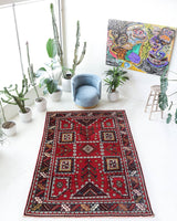 Vintage Turkish rug in a living room setting, Area rug in a living room setting, pile rug, Turkish rug, custom rug, modern rug, portland, rug shop, bright colors, wild shaman, soft rug, bold color, Portland, Oregon, rug store, rug shop, local shop