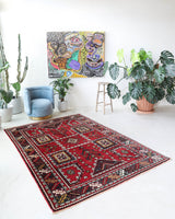 Vintage Turkish rug in a living room setting, Area rug in a living room setting, pile rug, Turkish rug, custom rug, modern rug, portland, rug shop, bright colors, wild shaman, soft rug, bold color, Portland, Oregon, rug store, rug shop, local shop