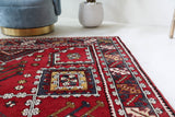 Vintage Turkish rug in a living room setting, Area rug in a living room setting, pile rug, Turkish rug, custom rug, modern rug, portland, rug shop, bright colors, wild shaman, soft rug, bold color, Portland, Oregon, rug store, rug shop, local shop