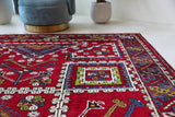 Vintage Turkish rug in a living room setting, Area rug in a living room setting, pile rug, Turkish rug, custom rug, modern rug, portland, rug shop, bright colors, wild shaman, soft rug, bold color, Portland, Oregon, rug store, rug shop, local shop
