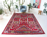 Vintage Turkish rug in a living room setting, Area rug in a living room setting, pile rug, Turkish rug, custom rug, modern rug, portland, rug shop, bright colors, wild shaman, soft rug, bold color, Portland, Oregon, rug store, rug shop, local shop