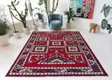Vintage Turkish rug in a living room setting, Area rug in a living room setting, pile rug, Turkish rug, custom rug, modern rug, portland, rug shop, bright colors, wild shaman, soft rug, bold color, Portland, Oregon, rug store, rug shop, local shop