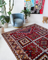 Vintage Turkish rug in a living room setting, Area rug in a living room setting, pile rug, Turkish rug, custom rug, modern rug, portland, rug shop, bright colors, wild shaman, soft rug, bold color, Portland, Oregon, rug store, rug shop, local shop