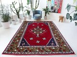 Vintage Turkish rug in a living room setting, Area rug in a living room setting, pile rug, Turkish rug, custom rug, modern rug, portland, rug shop, bright colors, wild shaman, soft rug, bold color, Portland, Oregon, rug store, rug shop, local shop