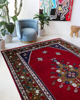 Vintage Turkish rug in a living room setting, Area rug in a living room setting, pile rug, Turkish rug, custom rug, modern rug, portland, rug shop, bright colors, wild shaman, soft rug, bold color, Portland, Oregon, rug store, rug shop, local shop