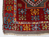Vintage Turkish runner rug in a living room setting, pile rug, Turkish rug, vintage rug, portland, rug shop, bright colors, wild shaman, soft rug, bold color, Portland, Oregon, rug store, rug shop, local shop, antique rug