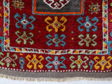 Vintage Turkish runner rug in a living room setting, pile rug, Turkish rug, vintage rug, portland, rug shop, bright colors, wild shaman, soft rug, bold color, Portland, Oregon, rug store, rug shop, local shop, antique rug