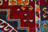 Vintage Turkish runner rug in a living room setting, pile rug, Turkish rug, vintage rug, portland, rug shop, bright colors, wild shaman, soft rug, bold color, Portland, Oregon, rug store, rug shop, local shop, antique rug