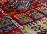 Vintage Turkish runner rug in a living room setting, pile rug, Turkish rug, vintage rug, portland, rug shop, bright colors, wild shaman, soft rug, bold color, Portland, Oregon, rug store, rug shop, local shop, antique rug