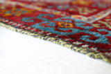Vintage Turkish runner rug in a living room setting, pile rug, Turkish rug, vintage rug, portland, rug shop, bright colors, wild shaman, soft rug, bold color, Portland, Oregon, rug store, rug shop, local shop, antique rug