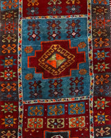 Vintage Turkish runner rug in a living room setting, pile rug, Turkish rug, vintage rug, portland, rug shop, bright colors, wild shaman, soft rug, bold color, Portland, Oregon, rug store, rug shop, local shop, antique rug
