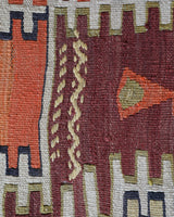 Vintage kilim rug in living room setting, old rug, antique rug, pastel colors, faded colors, Turkish rug, vintage rug, soft rug, Portland, Oregon, rug store, rug shop, local shop, earthy tones, earthy colors, warm colors