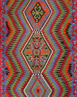 Vintage kilim rug in living room setting, bright colors, wild shaman, soft rug, bold color, Portland, Oregon, rug store, rug shop, local shop, vintage rug, modern kilim, warm colors, antique kilim rug