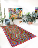 Vintage kilim rug in living room setting, bright colors, wild shaman, soft rug, bold color, Portland, Oregon, rug store, rug shop, local shop, vintage rug, modern kilim, warm colors, antique kilim rug
