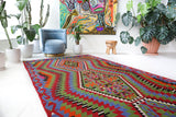 Vintage kilim rug in living room setting, bright colors, wild shaman, soft rug, bold color, Portland, Oregon, rug store, rug shop, local shop, vintage rug, modern kilim, warm colors, antique kilim rug