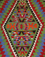 Vintage kilim rug in living room setting, bright colors, wild shaman, soft rug, bold color, Portland, Oregon, rug store, rug shop, local shop, vintage rug, modern kilim, warm colors, antique kilim rug