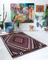 Vintage kilim rug in living room setting, bright colors, wild shaman, soft rug, bold color, Portland, Oregon, rug store, rug shop, local shop, vintage rug, modern kilim, warm colors, antique kilim rug