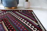 Vintage kilim rug in living room setting, bright colors, wild shaman, soft rug, bold color, Portland, Oregon, rug store, rug shop, local shop, vintage rug, modern kilim, warm colors, antique kilim rug