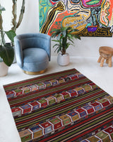 Vintage kilim rug in living room setting, bright colors, wild shaman, soft rug, bold color, Portland, Oregon, rug store, rug shop, local shop, vintage rug, modern kilim, warm colors, antique kilim rug